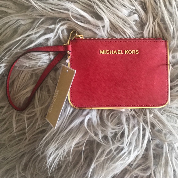 Michael Kors Handbags - Cherry red Michael Kors Jet Set leather wristlet🍒
